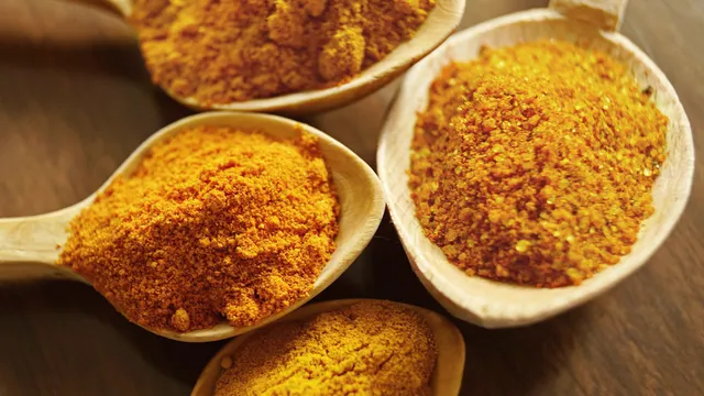 Turmeric in spoons